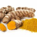 ground-turmeric-and-whole-turmeric-roots-16X9